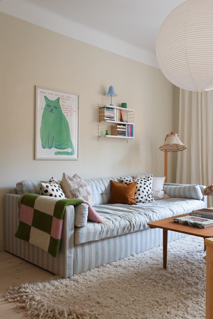 light blue striped sofa