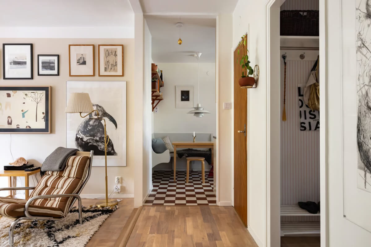 A Cozy Swedish Apartment in a 1950s Building 8 living room view into kitchen