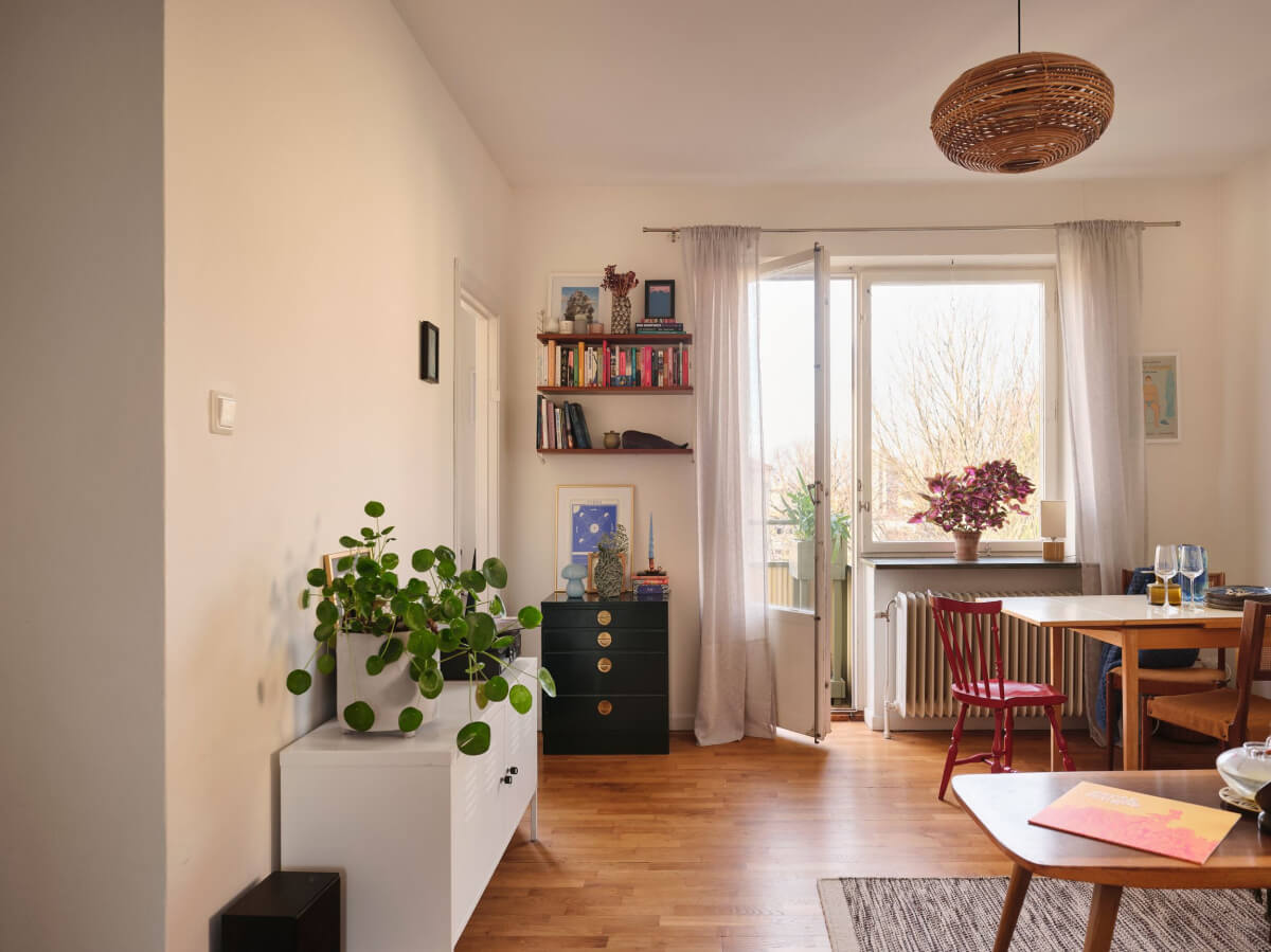 A Small, Light Swedish Apartment with Midcentury Features 2 living room with balcony
