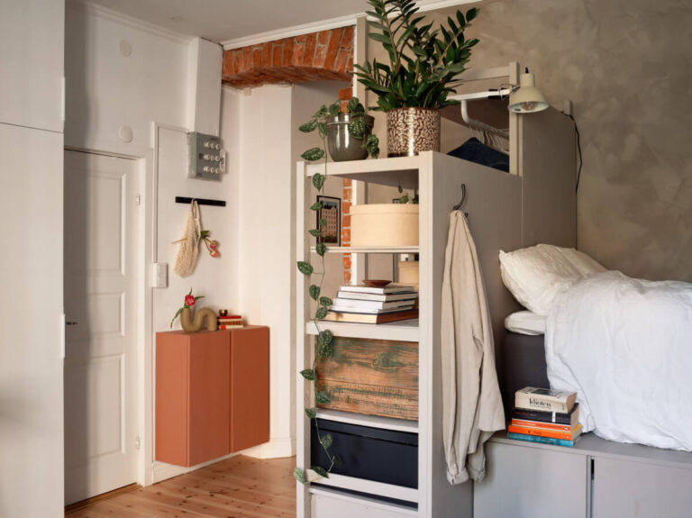 A Studio Apartment with Smart Storage Ideas and Exposed Brick - The ...