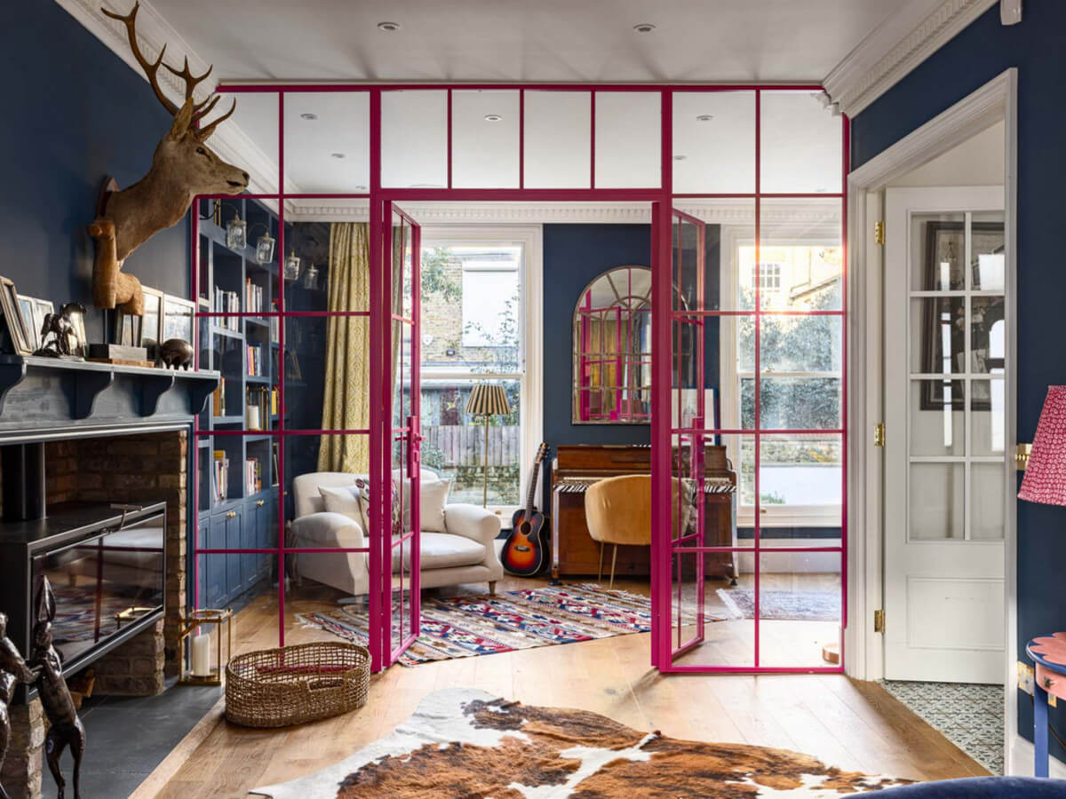 pink glass doors open living room dark blue walls