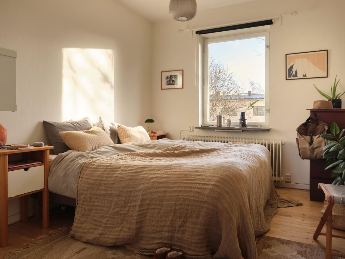 A Small, Light Swedish Apartment with Midcentury Features 18 serene bedroom