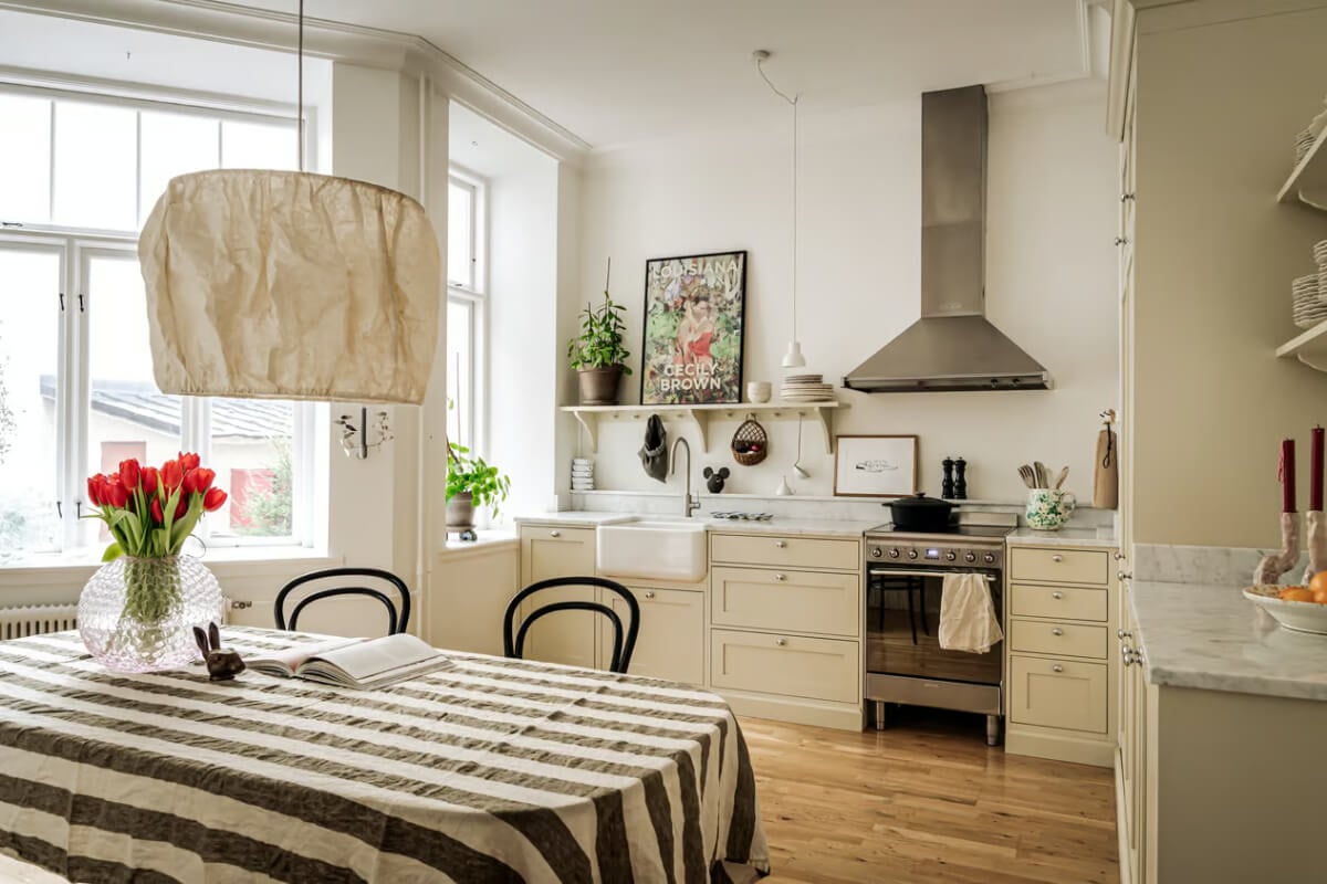 Large Rooms in an Art Nouveau Apartment in Sweden 8 serene kitchen with large table