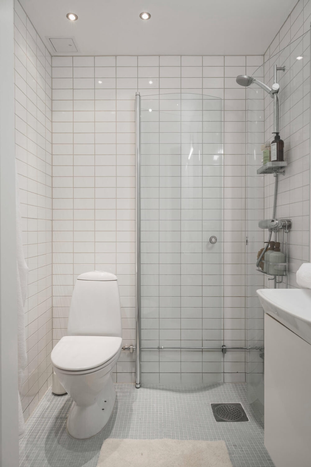 An Early 20th-Century Apartment with a Pink Kitchen 31 simple white bathroom