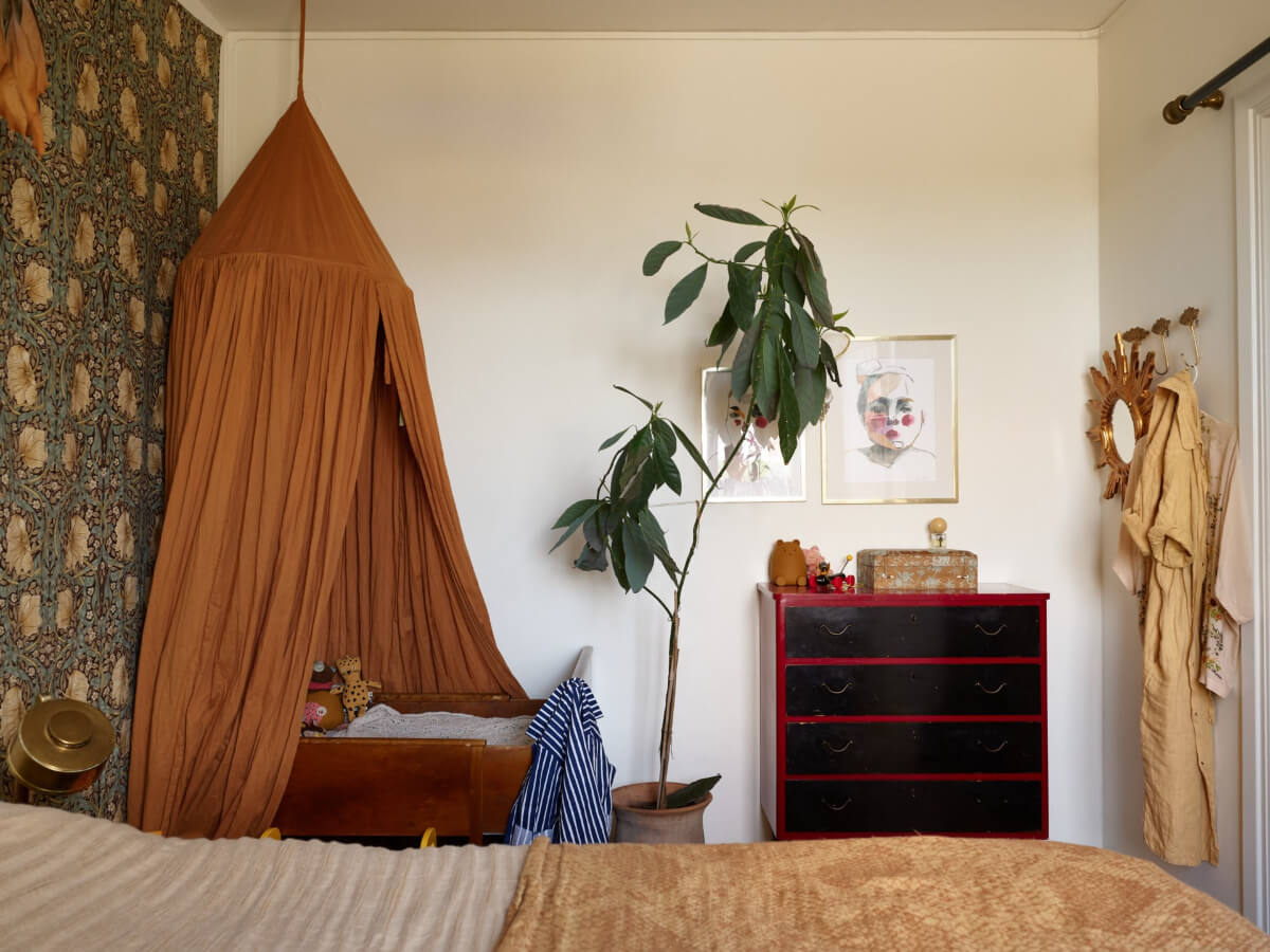 small combined bedroom A Small Vintage Apartment with a Tiny Green Patio Garden