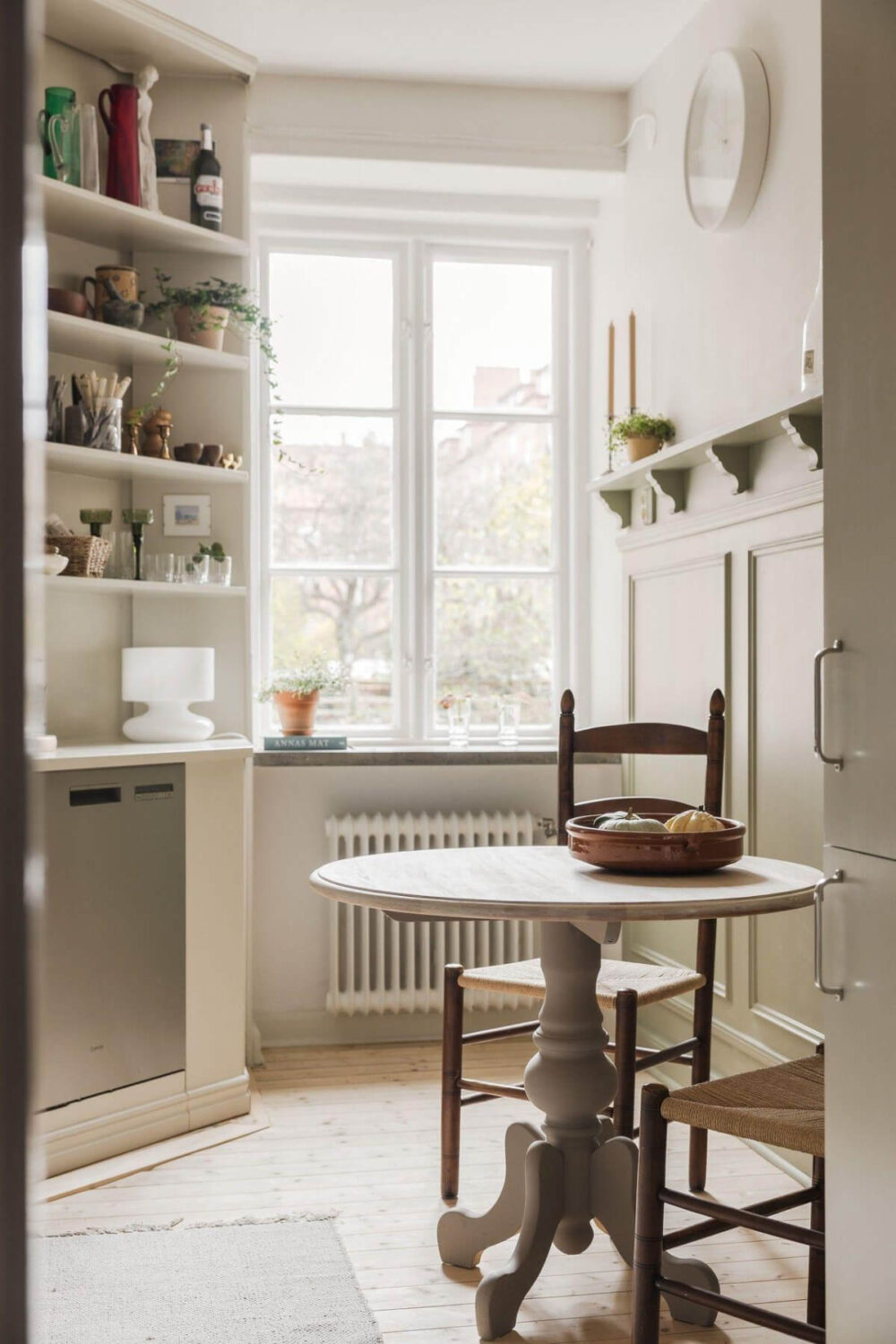 Natural Tones and Original Elements in a 1930s Apartment 7 small round kitchen table