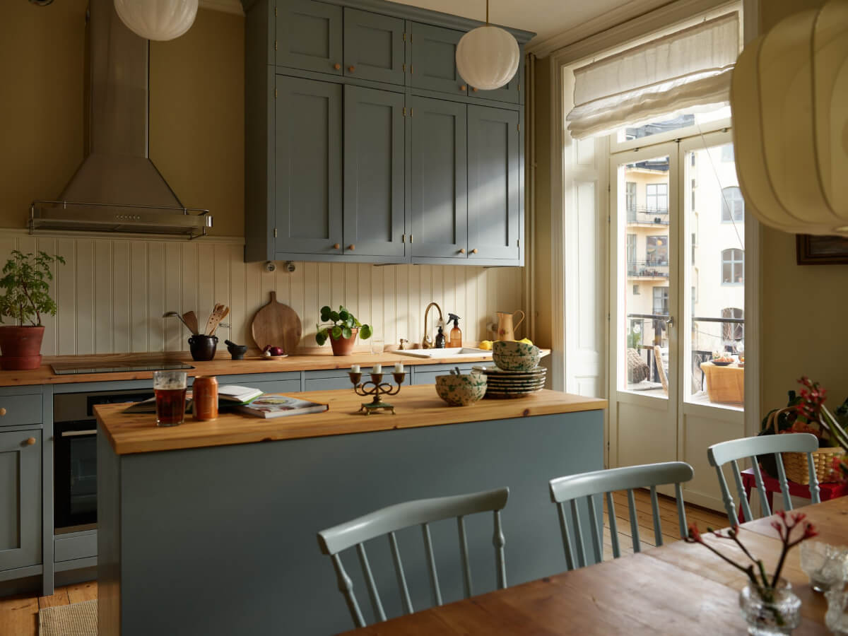 soft blue kitchen cabinets wooden countertop