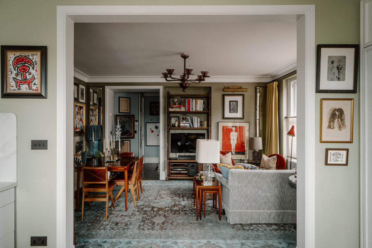 view into cozy living room with large blue toned rug
