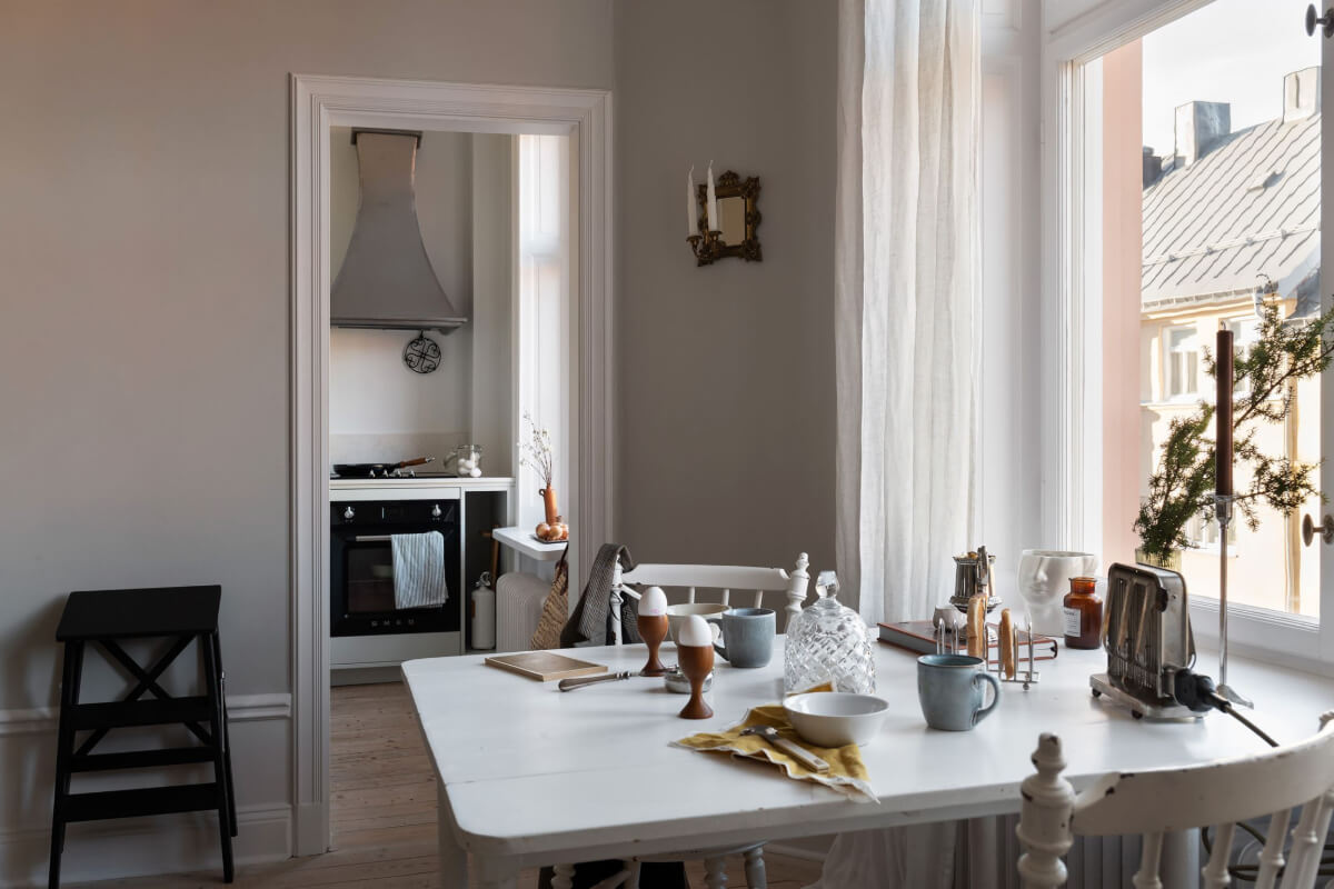 white table with view into kitchen