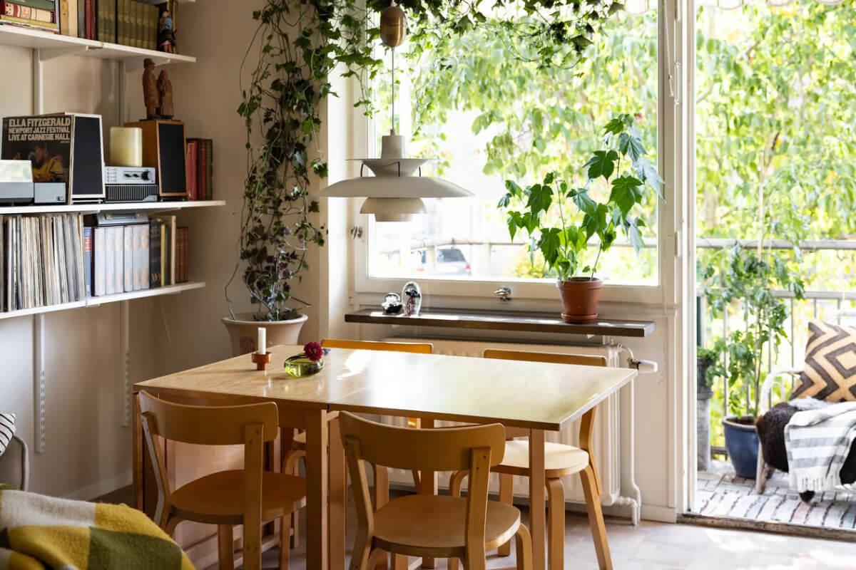 A Cozy Swedish Apartment in a 1950s Building 5 wooden dining table