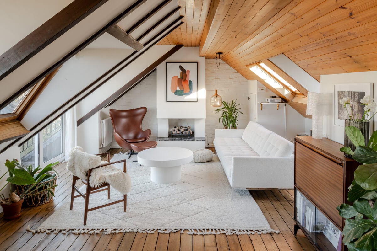 attic living room wooden ceiling white painted brick