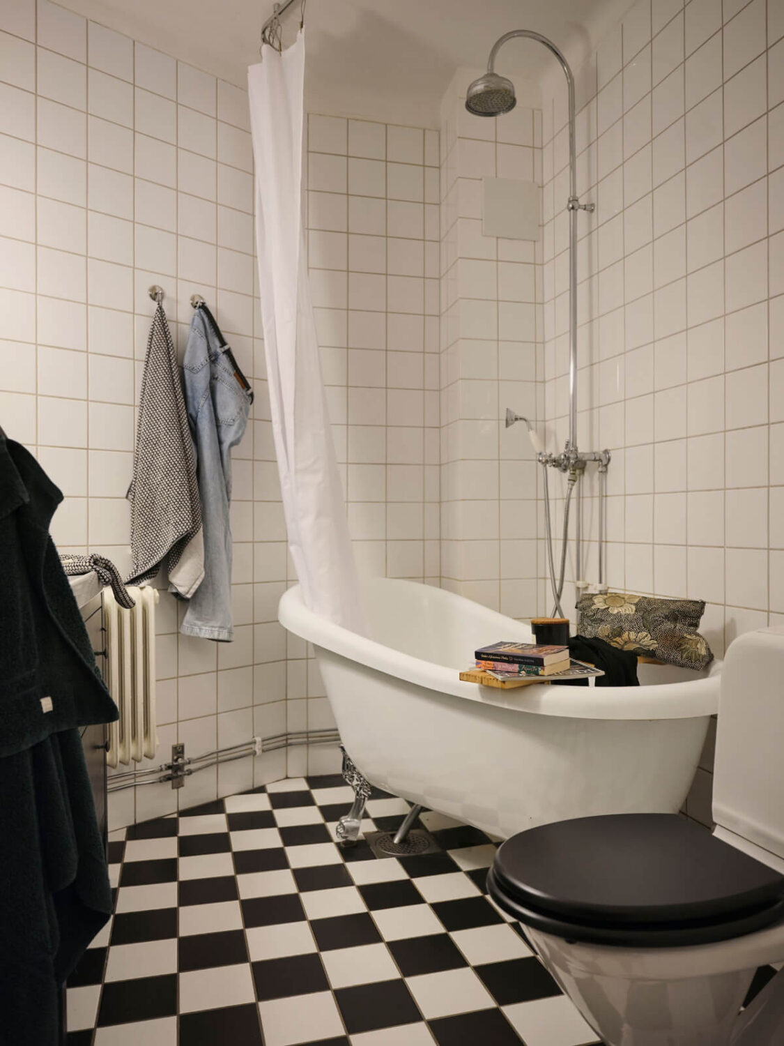 A Small Apartment with an Industrial Stainless Steel Kitchen 14 bathroom freestanding bath checkerboard floor