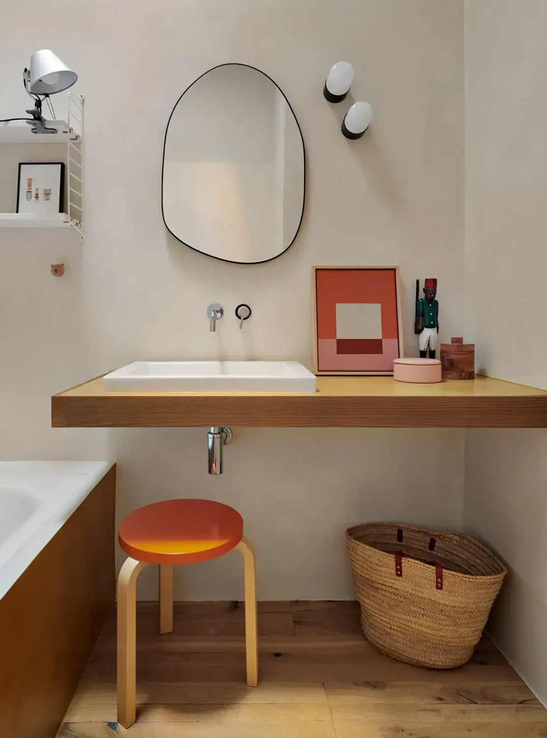 Colorful Contemporary Interiors in a 1930s Spanish House 14 bathroom orange stool