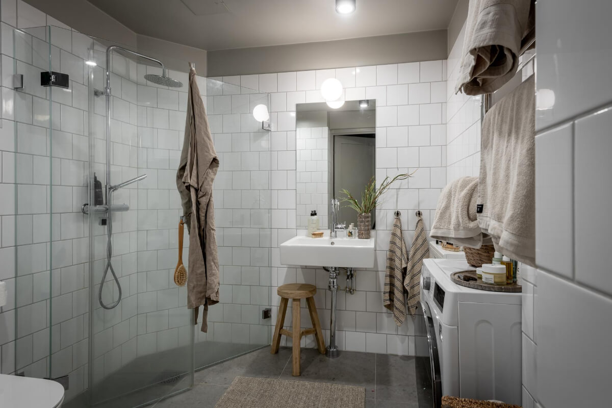 bathroom white tiles gray ceiling