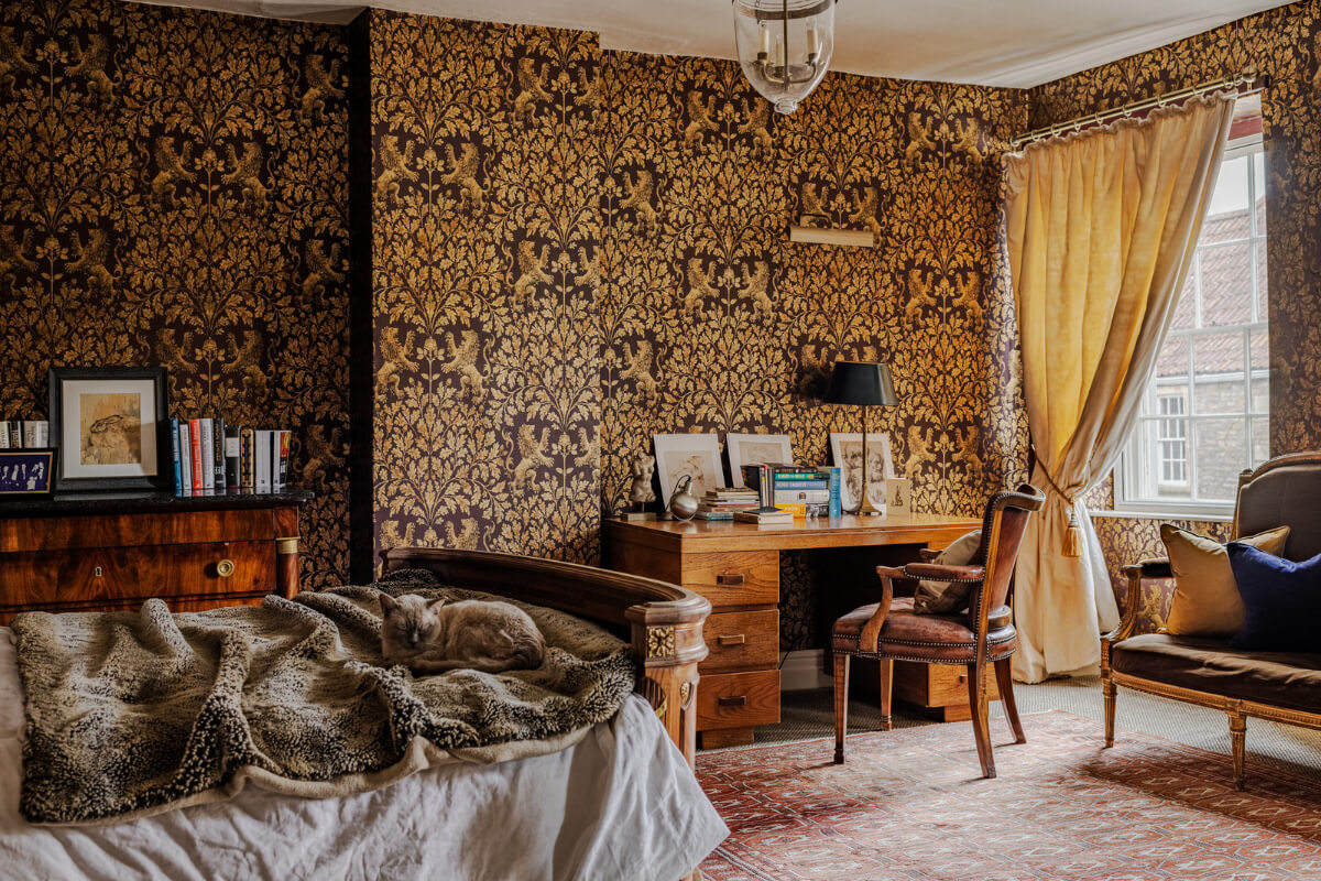 Period Features and Color in a Pretty Georgian House 19 bedroom dramatic black and gold wallpaper