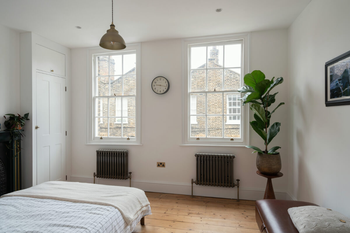 bedroom sash windows built-in wardrobe