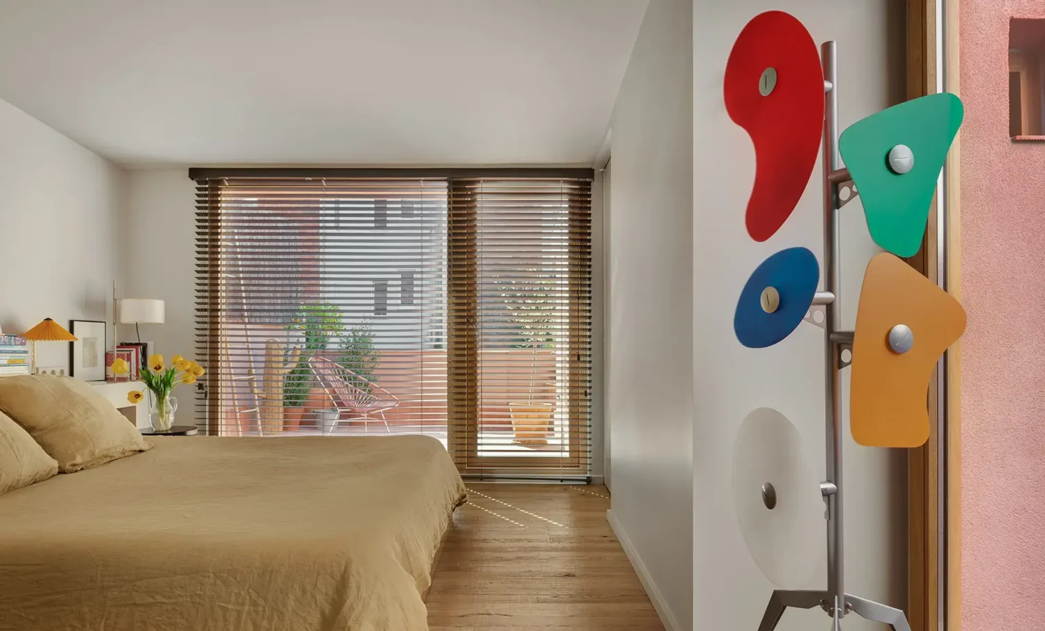 Colorful Contemporary Interiors in a 1930s Spanish House 10 bedroom with balcony