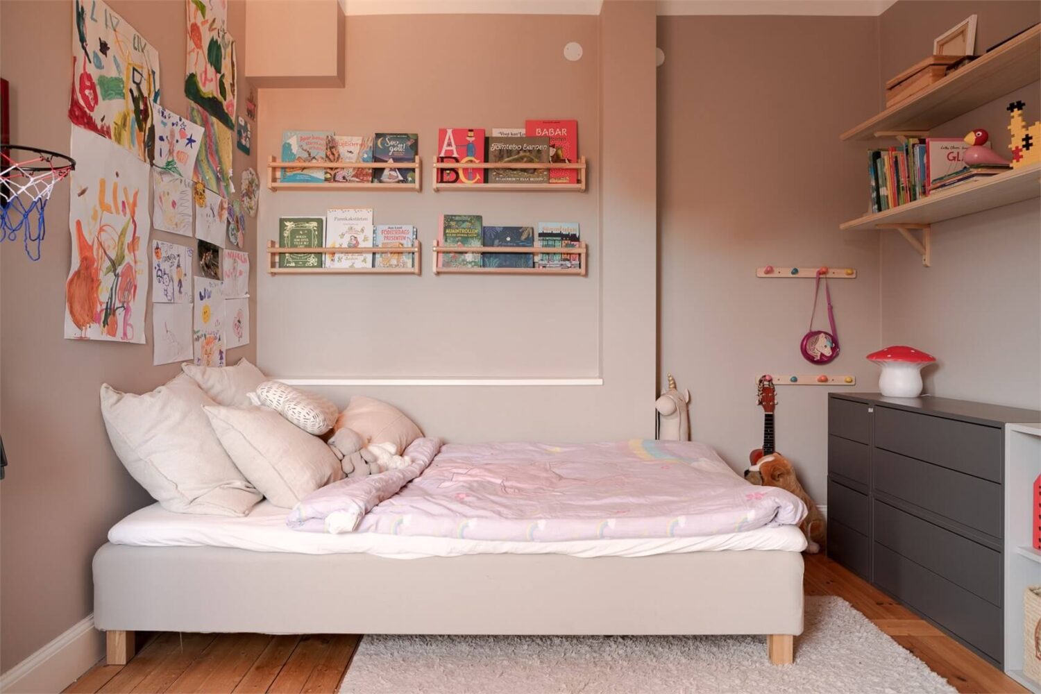 A Stockholm Apartment with a Light Yellow Kitchen 13 beige childrens room