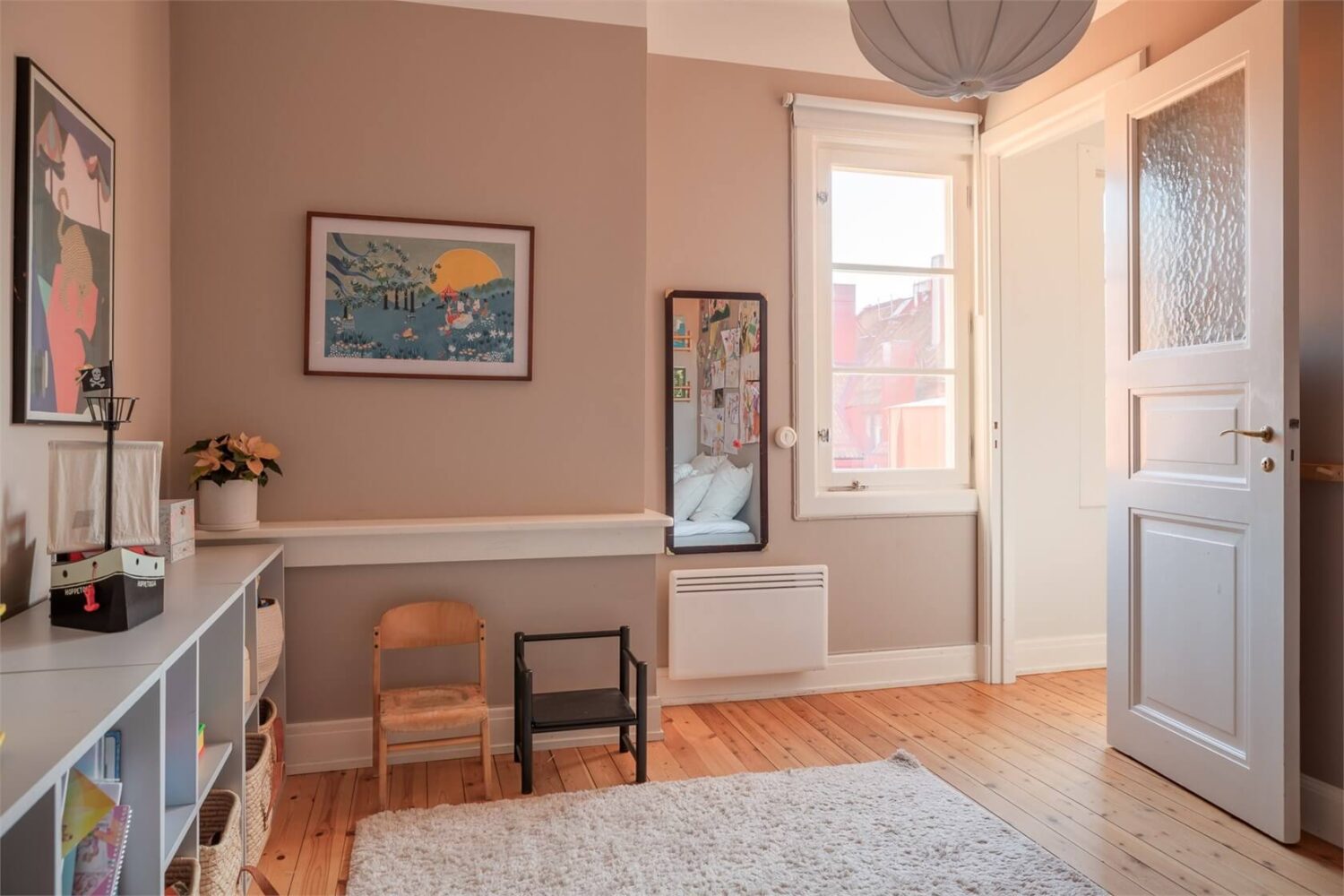 A Stockholm Apartment with a Light Yellow Kitchen 14 beige childrens room wooden floor