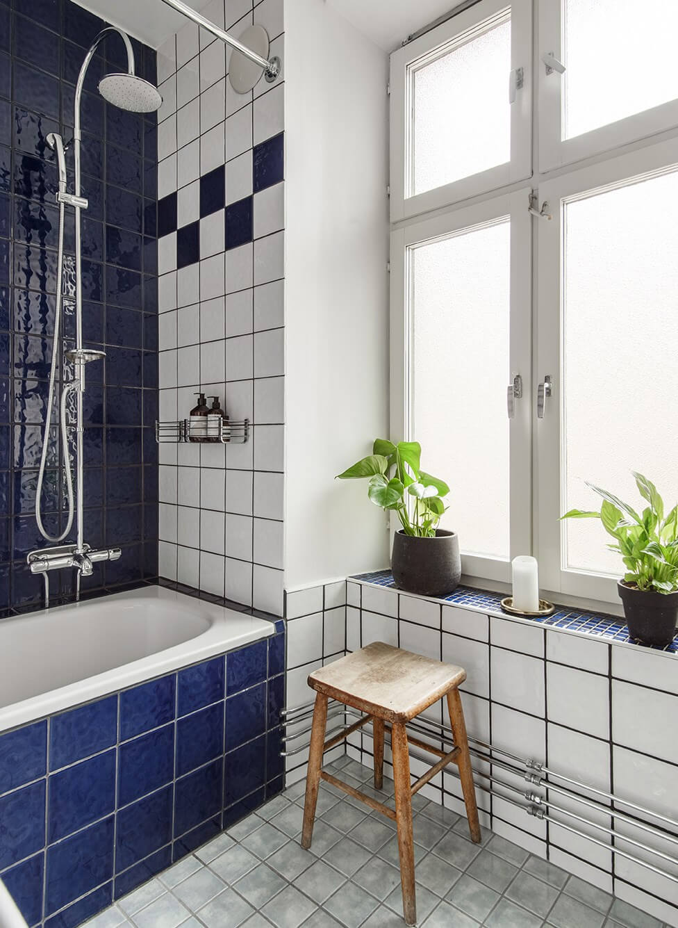 Rooms with Unique Shapes in a Lovely Swedish Apartment 20 blue and white tiles bathroom