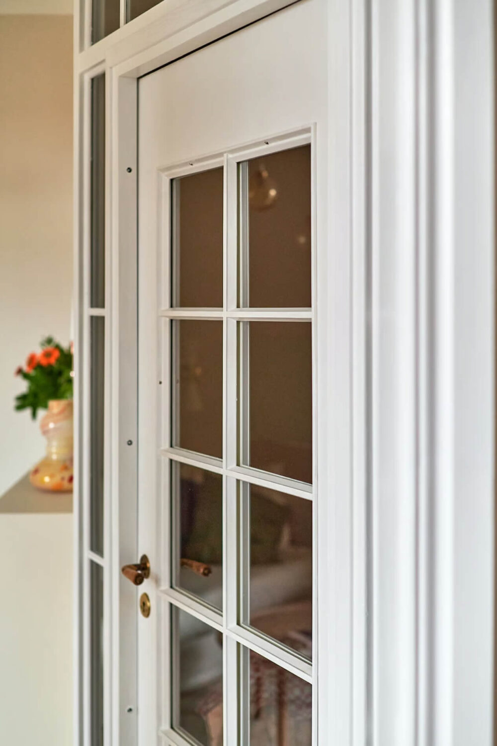 A Charming Swedish Apartment with a Spacious Balcony 20 glass bedroom door