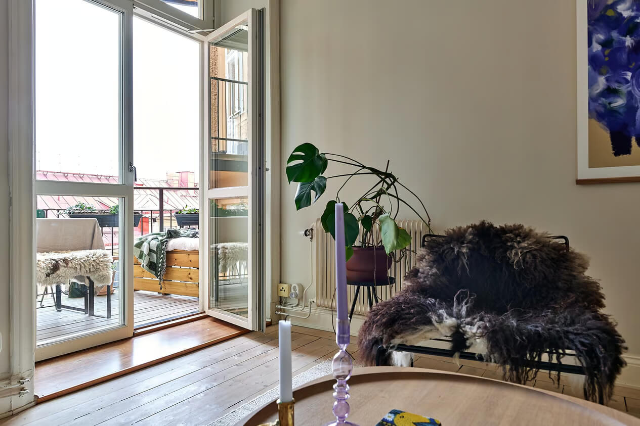 A Charming Swedish Apartment with a Spacious Balcony 5 glass doors to balcony