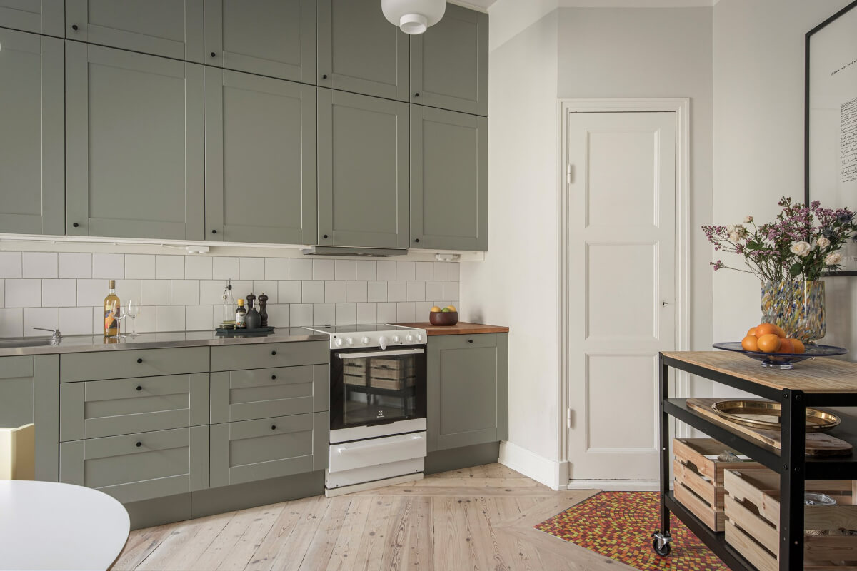 Rooms with Unique Shapes in a Lovely Swedish Apartment 14 gray-green kitchen cabients