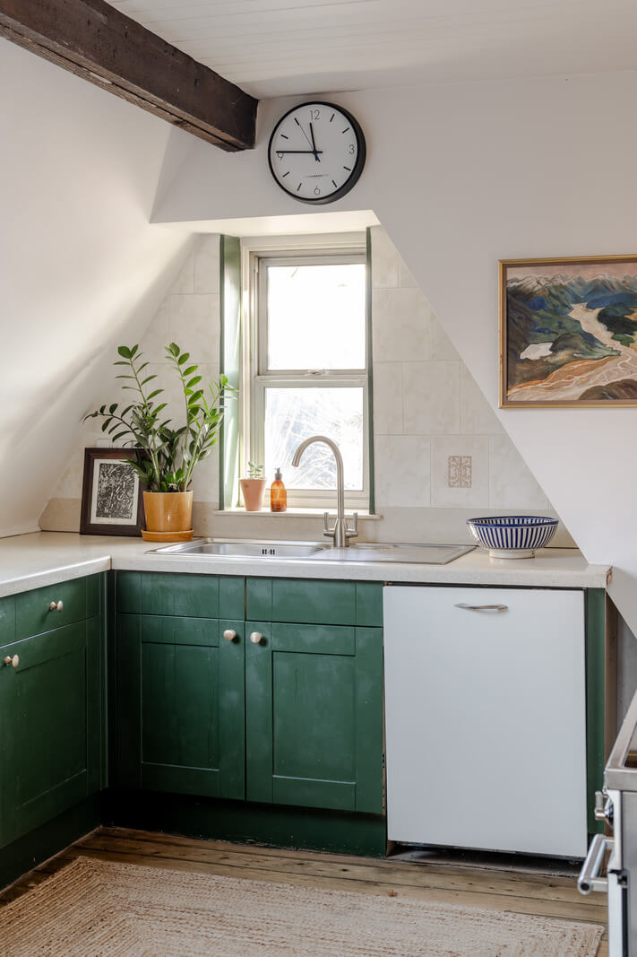 A Light Duplex Apartment in an Arts and Crafts Building 10 green kitchen exposed beam