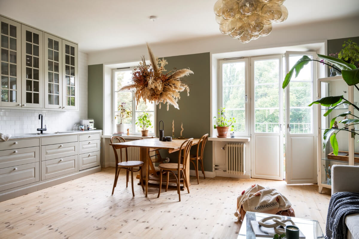 green open plan living space wooden floor