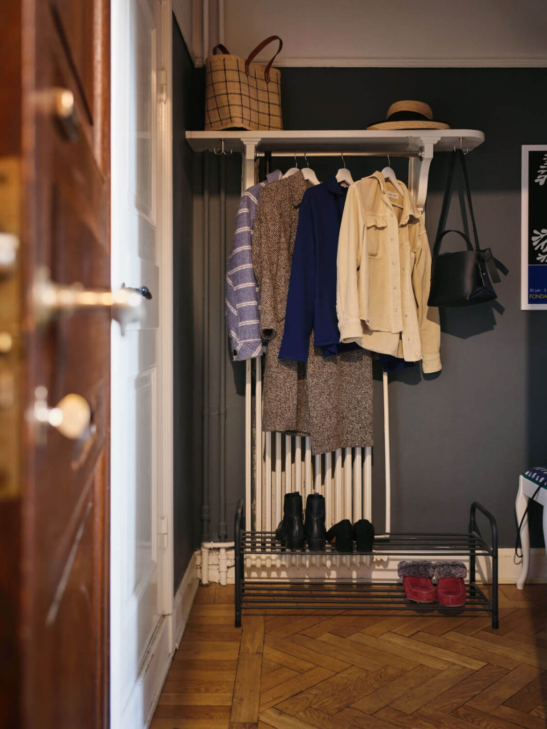 A Small Apartment with an Industrial Stainless Steel Kitchen 17 hall entry parquet floor hat shelf A Small Apartment with an Industrial Stainless Steel Kitchen