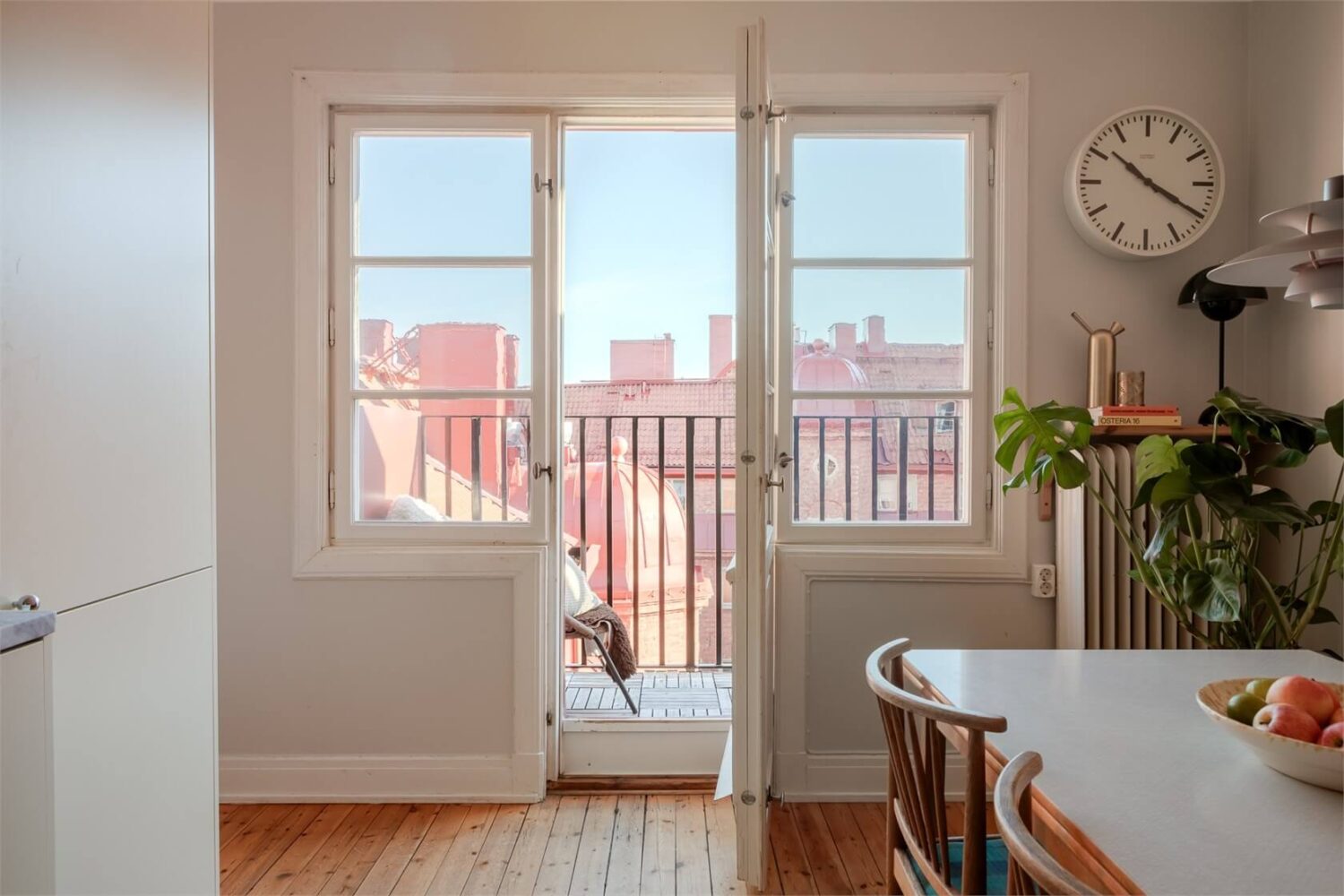 A Stockholm Apartment with a Light Yellow Kitchen 9 kitchen balcony