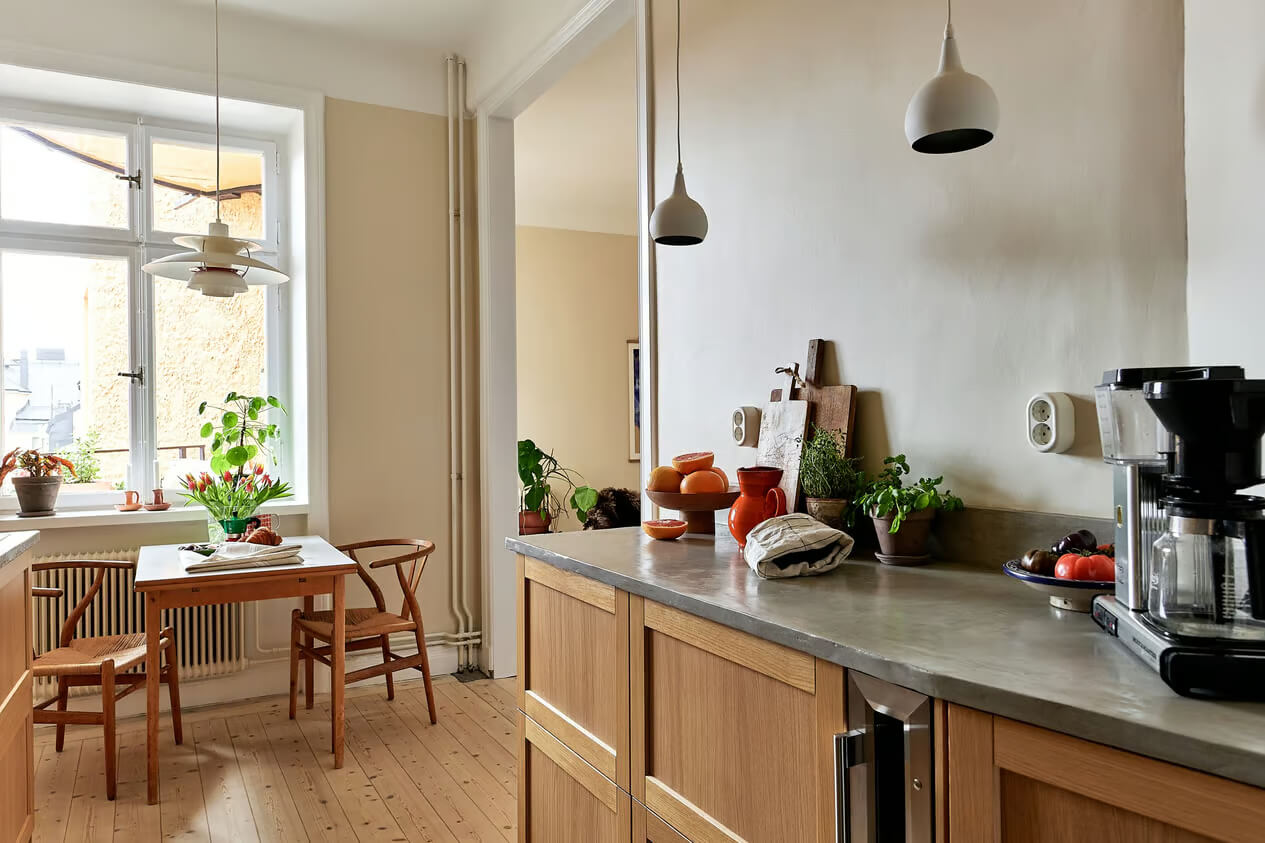 A Charming Swedish Apartment with a Spacious Balcony 13 kitchen concrete worktop