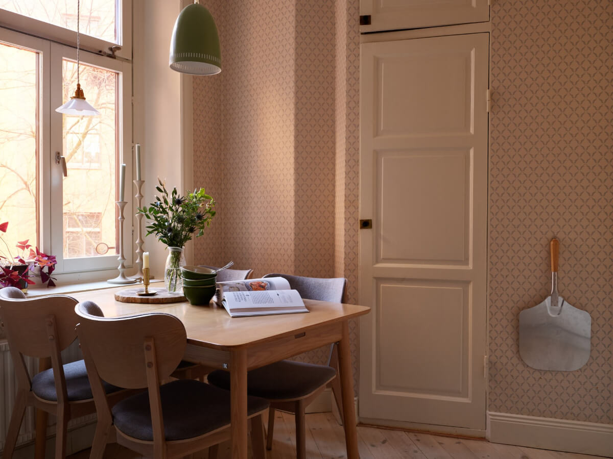 A Two-Bedroom Apartment with a Charming Bathroom 7 kitchen table by window