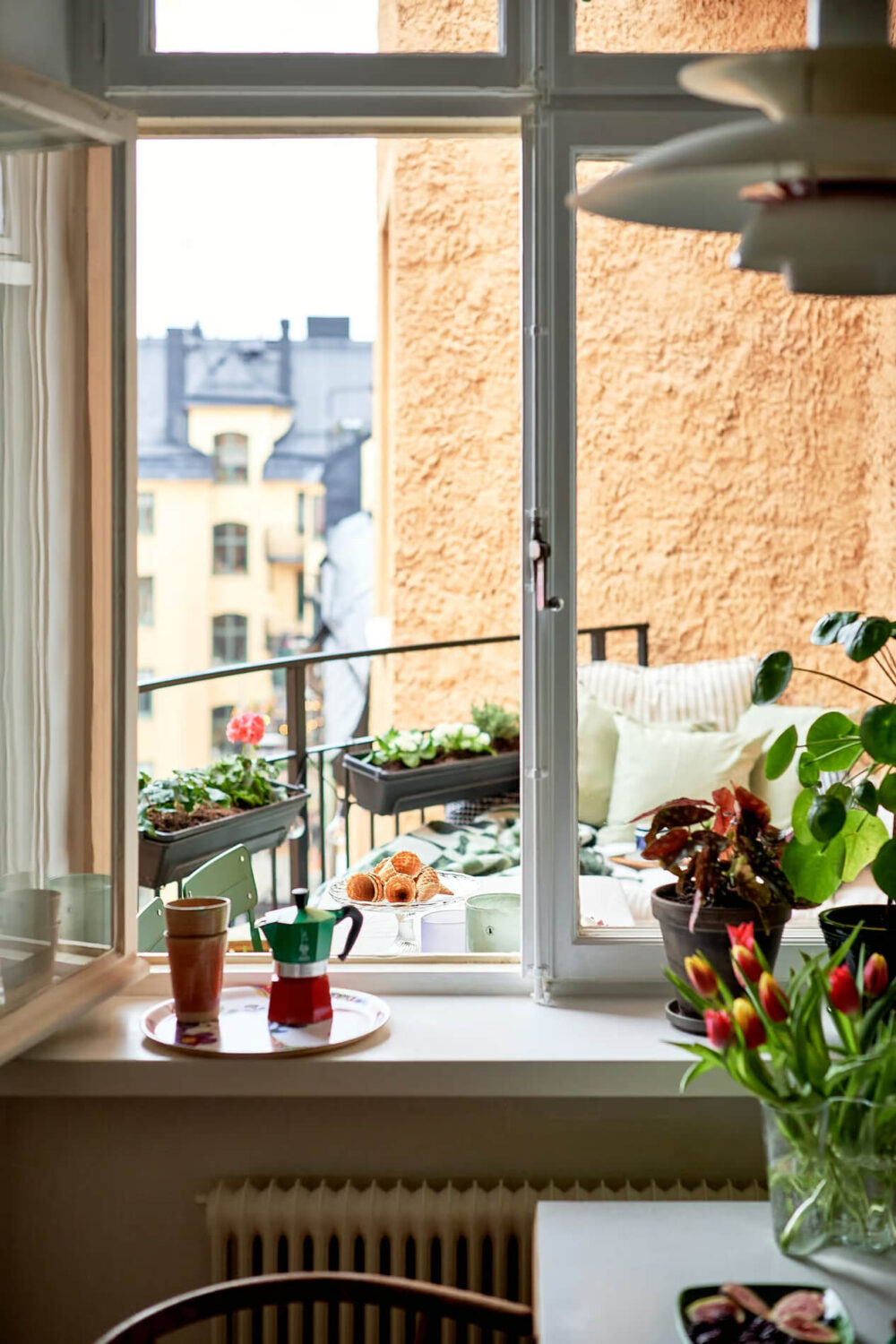 A Charming Swedish Apartment with a Spacious Balcony 17 kitchen view balcony