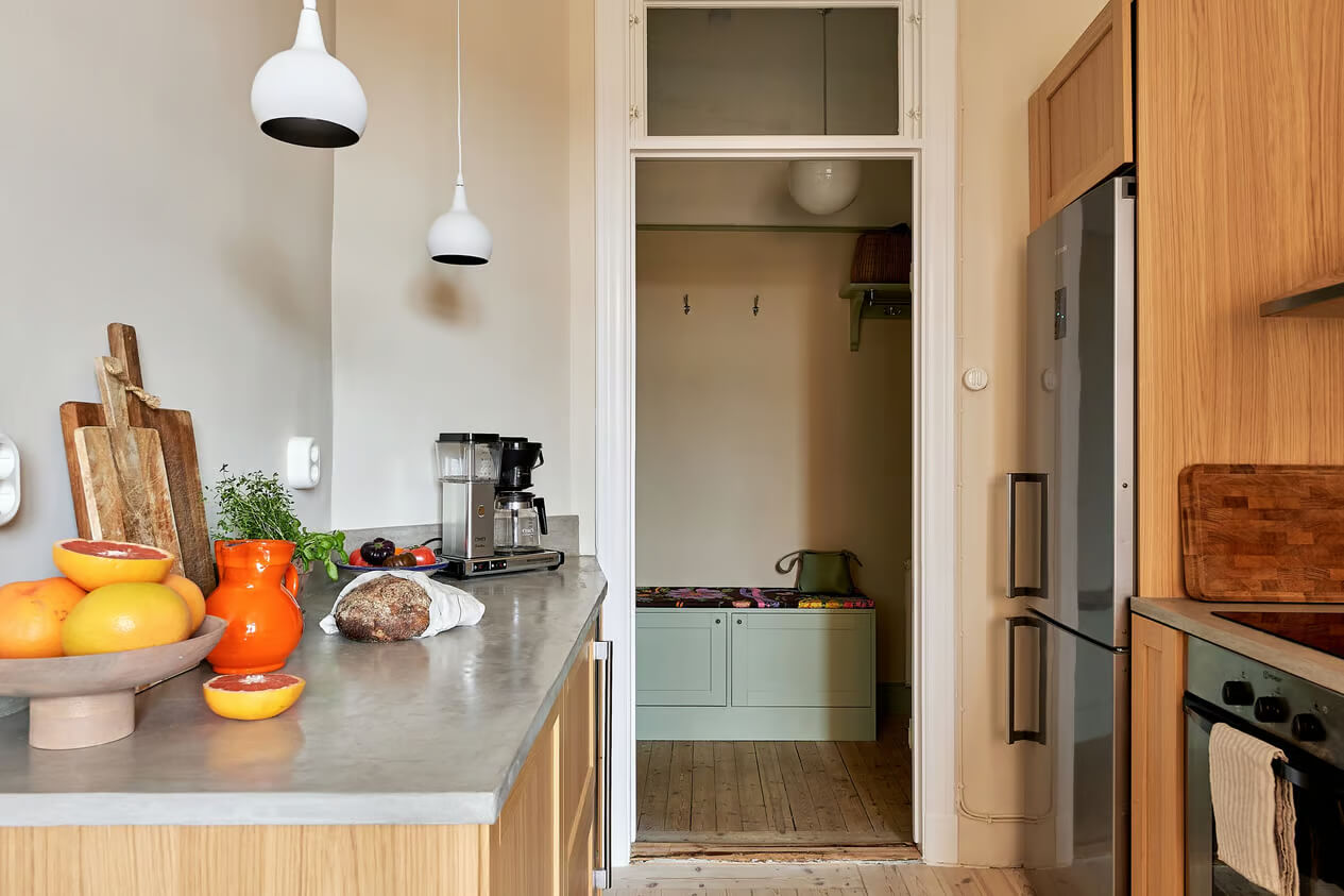 A Charming Swedish Apartment with a Spacious Balcony 19 kitchen view into hall