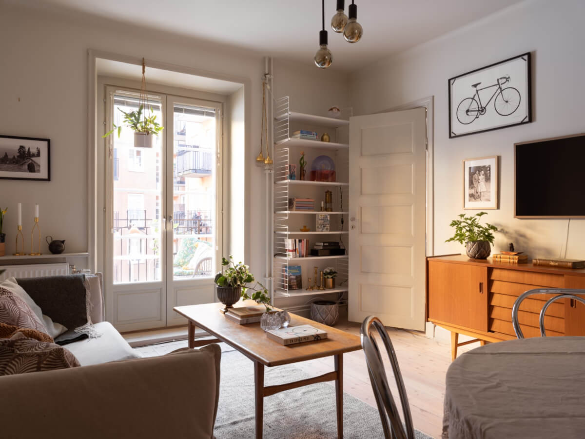 living room bookshelves balcony doors