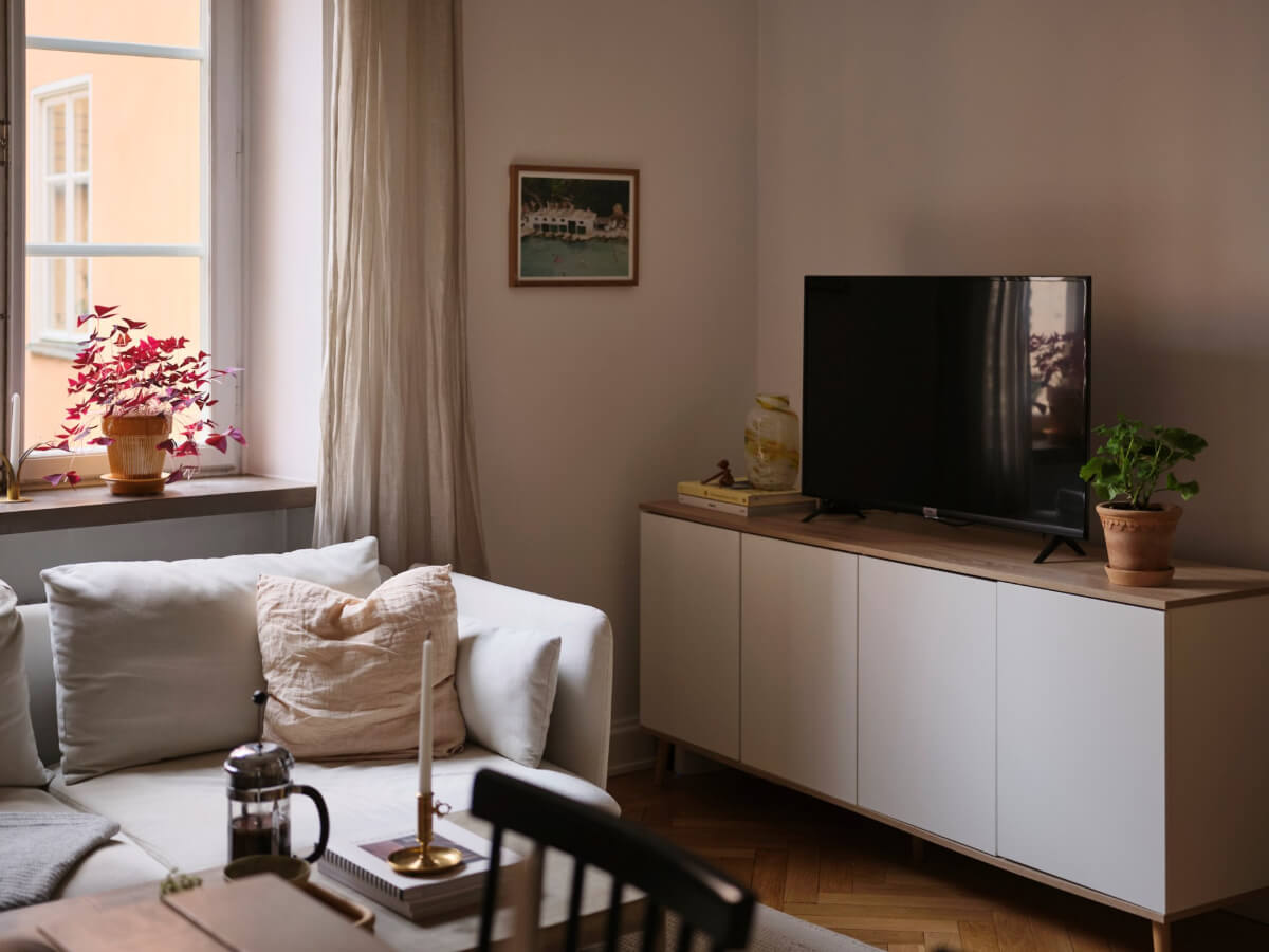 A Small Apartment with an Industrial Stainless Steel Kitchen 4 living room cabinet