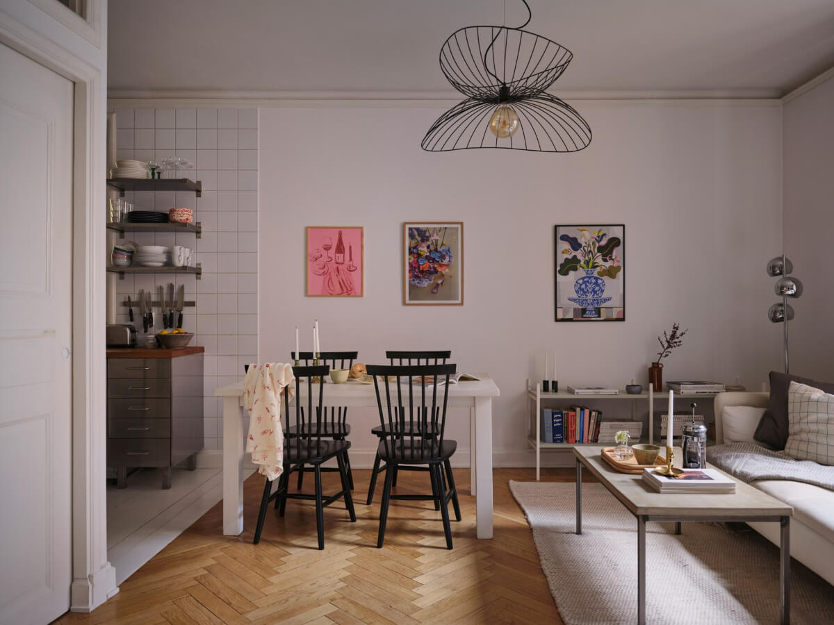 A Small Apartment with an Industrial Stainless Steel Kitchen 1 living room parquet floor white dining table