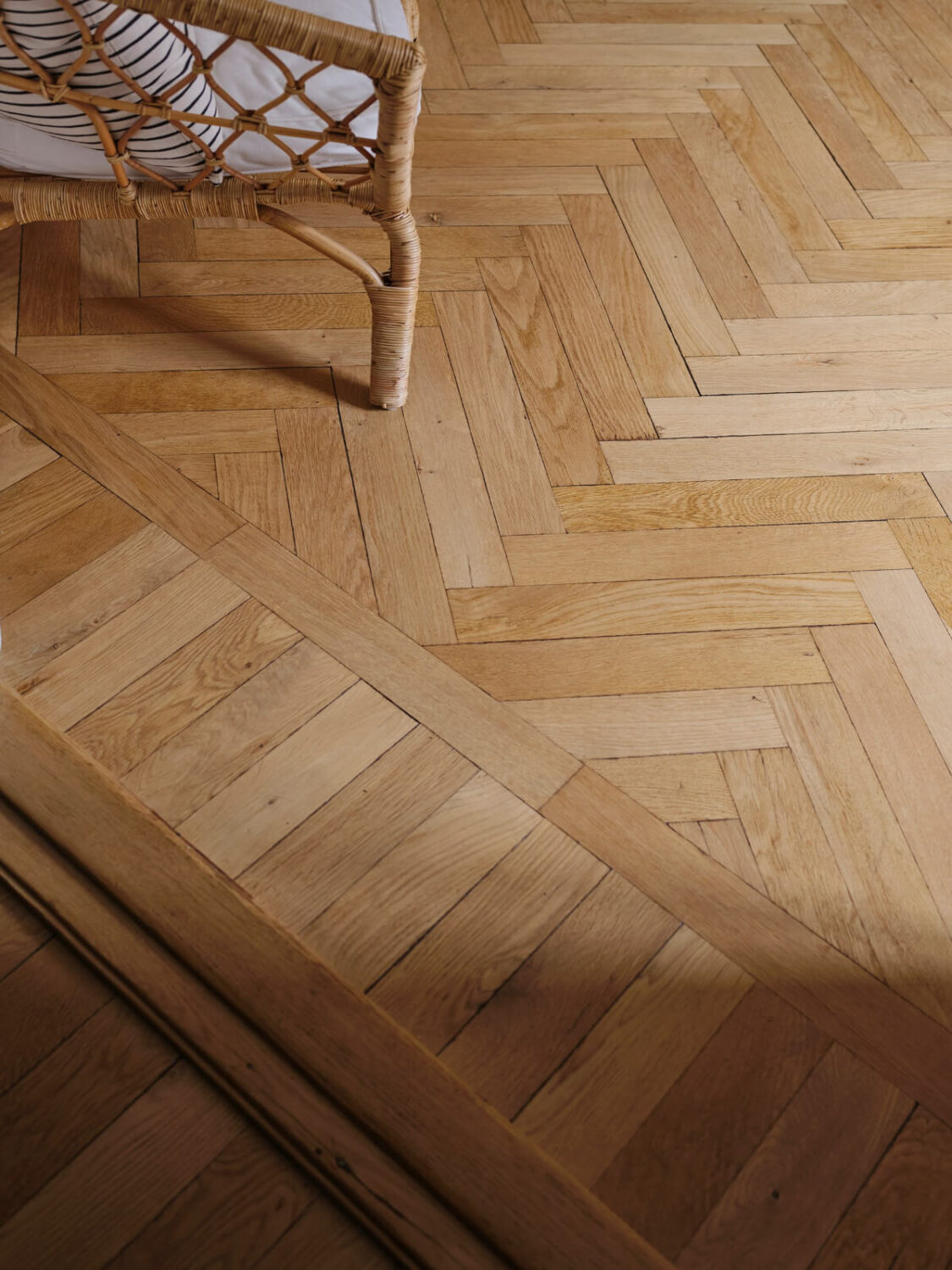 A Small Apartment with an Industrial Stainless Steel Kitchen 7 parquet floor