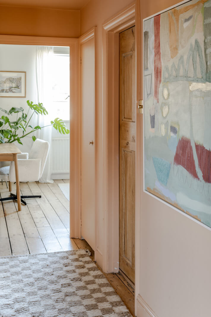 A Light Duplex Apartment in an Arts and Crafts Building 15 pink hall checkerboard rug