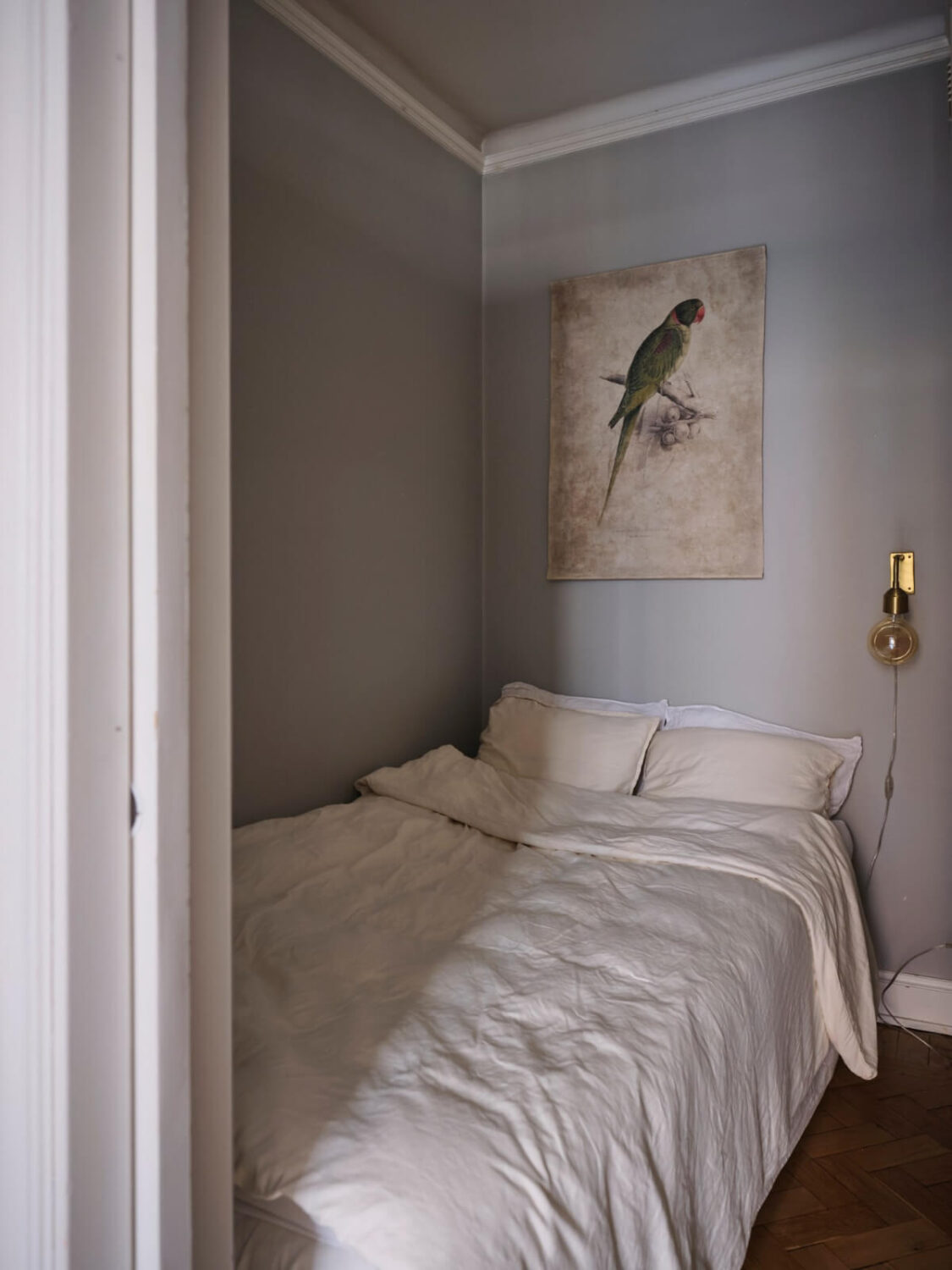 A Small Apartment with an Industrial Stainless Steel Kitchen 13 small gray bedroom