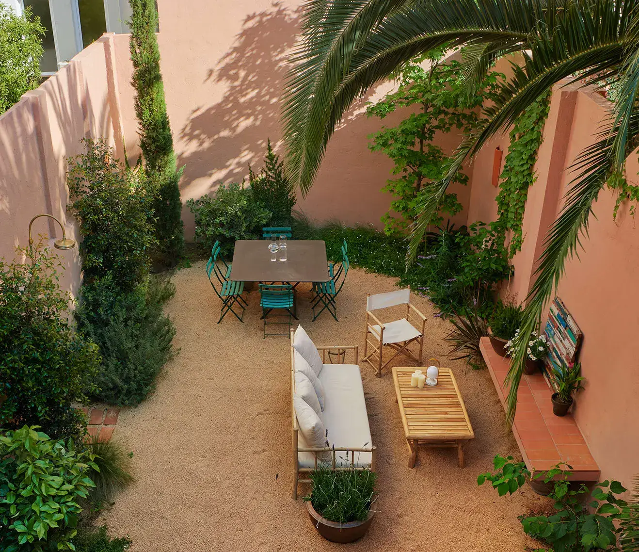 Colorful Contemporary Interiors in a 1930s Spanish House 15 walled garden