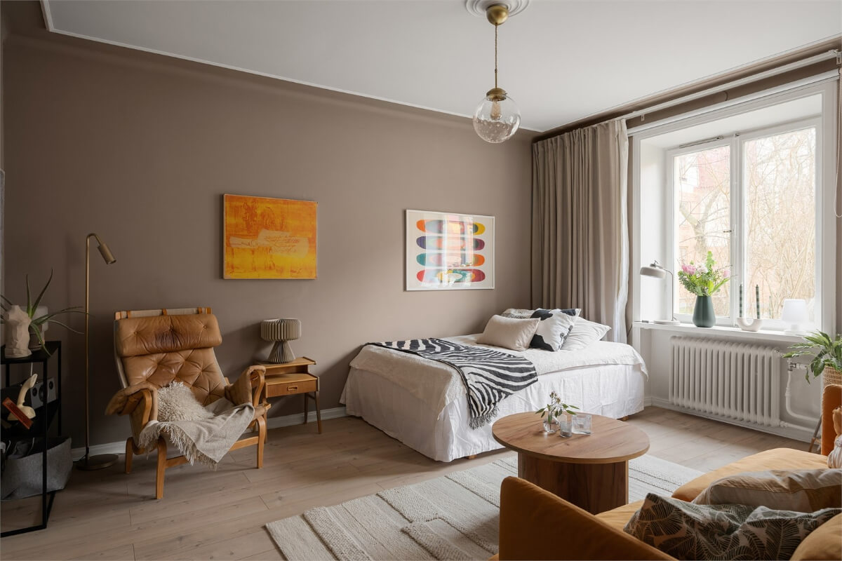 A Studio Apartment with Brown Walls 2 warm-colored studio apartment