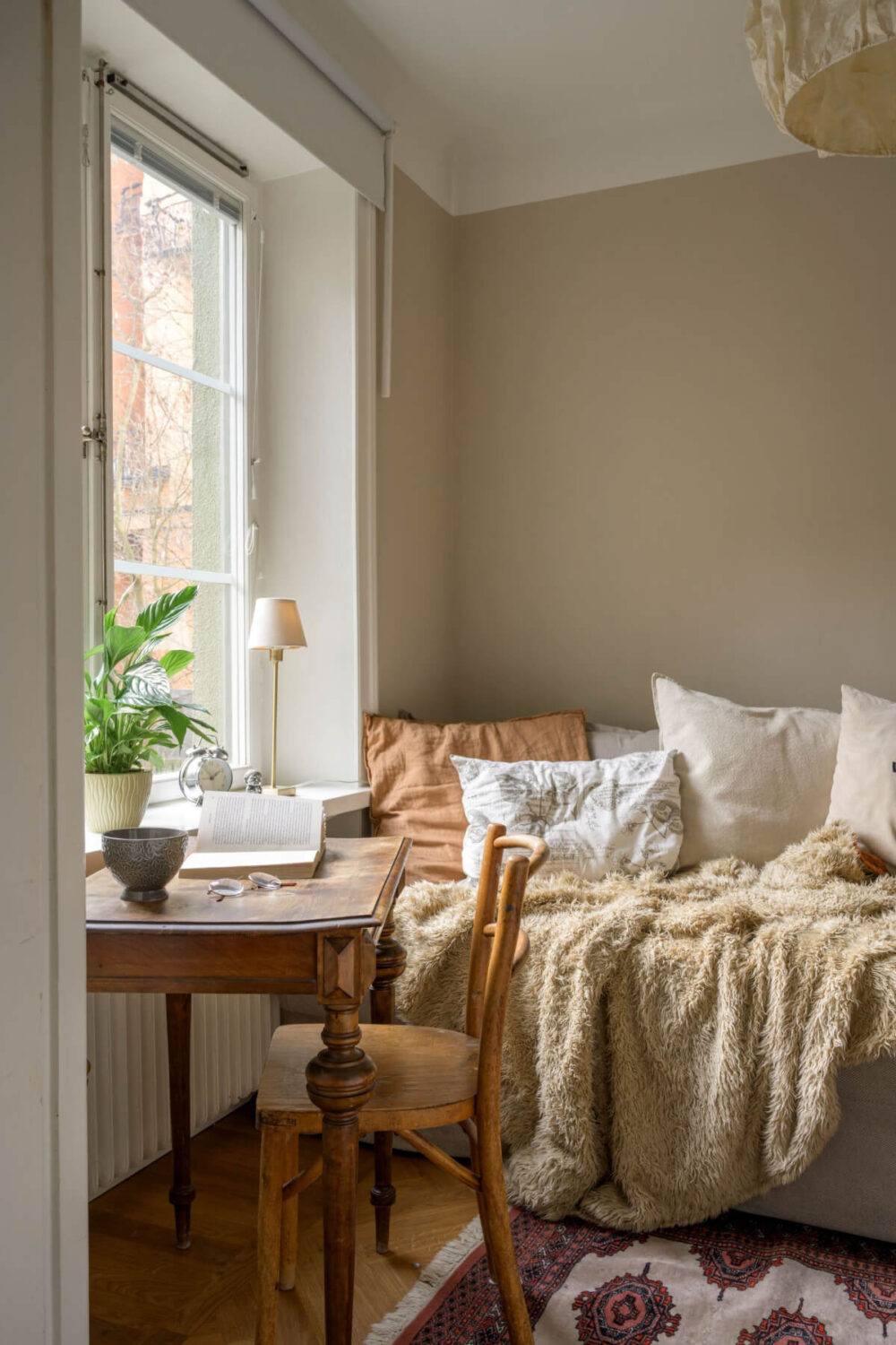 A Cozy Courtyard Apartment with a Brown Bedroom 12 MED5989902D0B0940E19FD80024E3C83EA7 1880x2820 1 A Cozy Courtyard Apartment with a Brown Bedroom