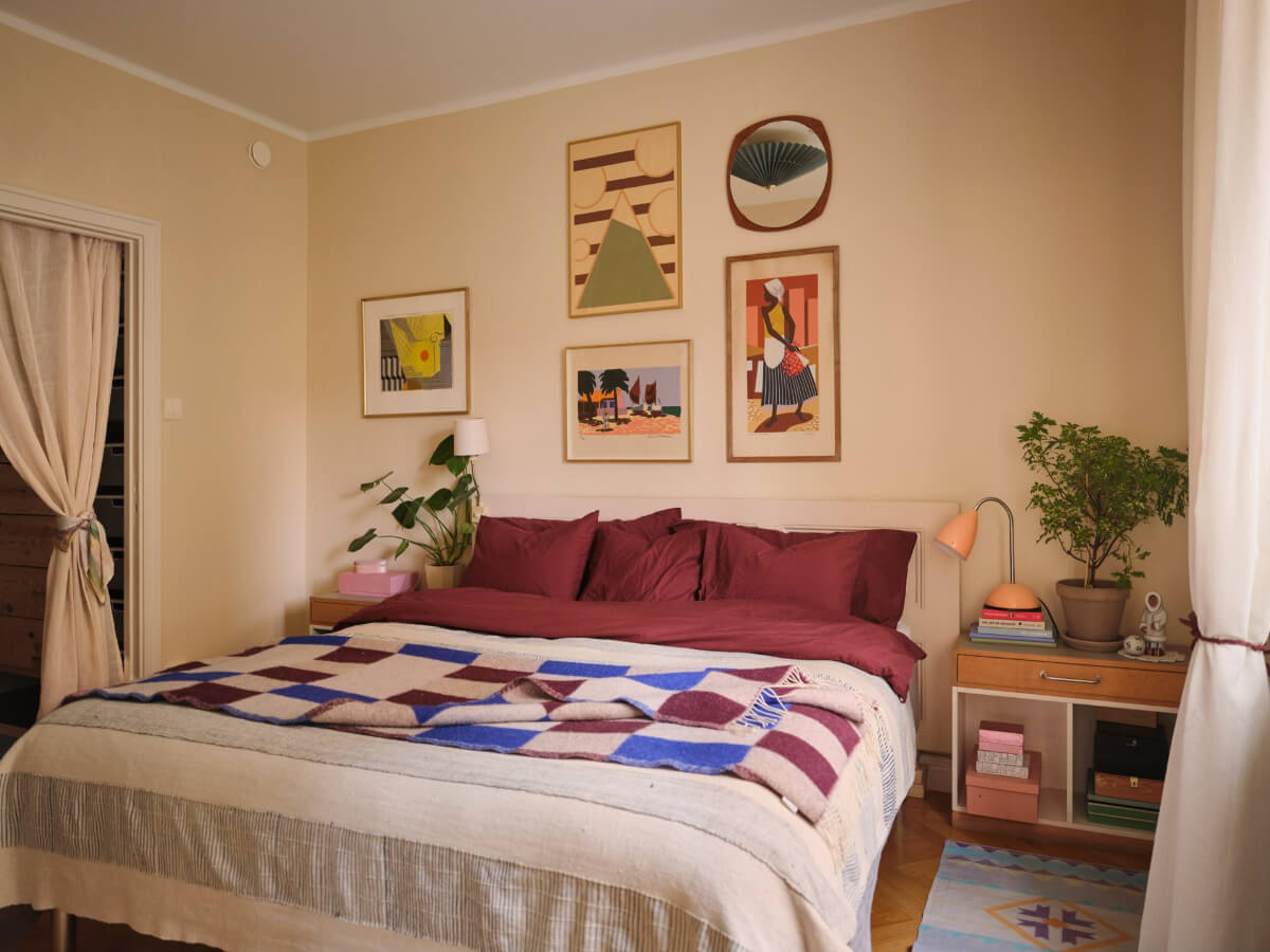 A Corner Apartment with Period Features and Bright Color Pops 11 bedroom beige-yellow walls