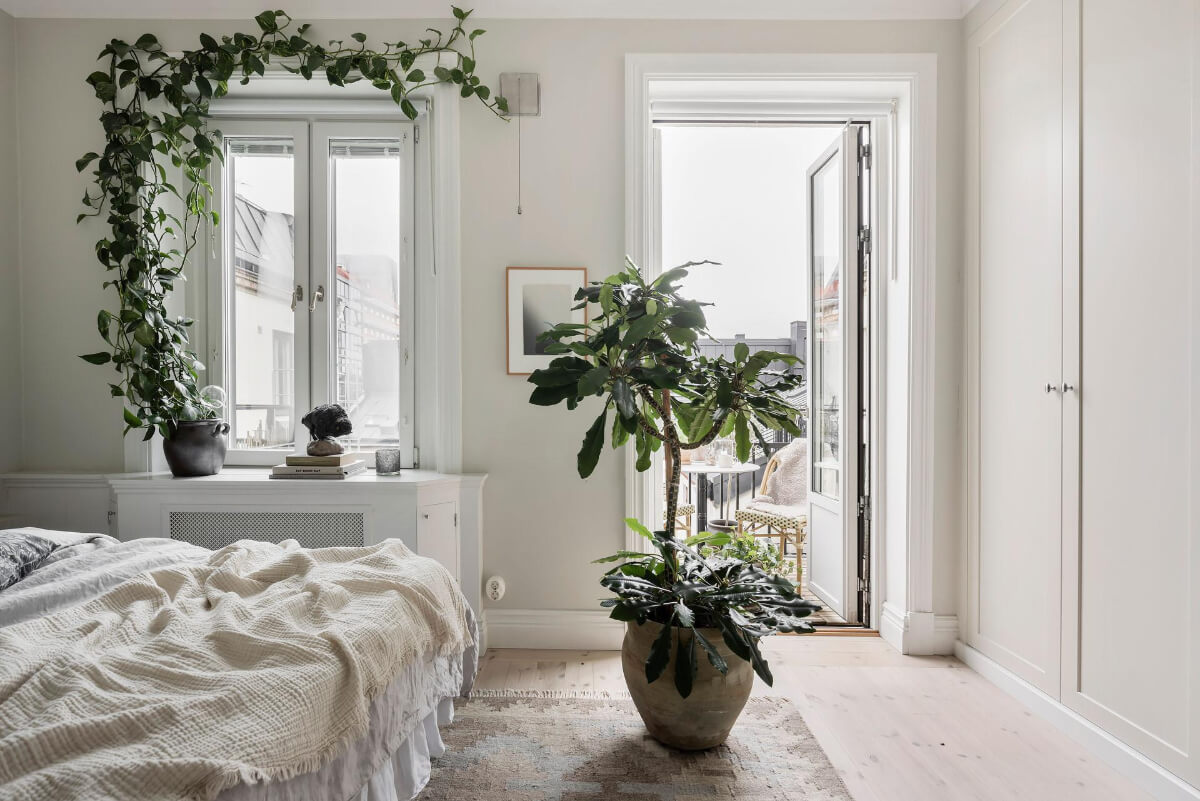 A Light Color Palette in a Stylish Renovated Late 19th Century Apartment 17 bedroom floor to ceiling built-in wardrobes