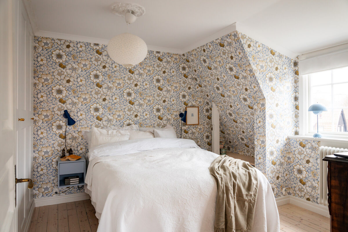 Turn-of-the-Century Charm Meets Modern Comfort in a Swedish House 19 bedroom floral wallpaper