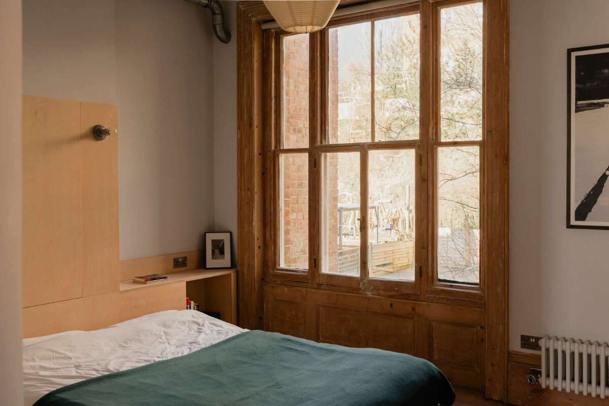 Bespoke Furniture in a Restored Seaside Apartment in England 16 bedroom large window