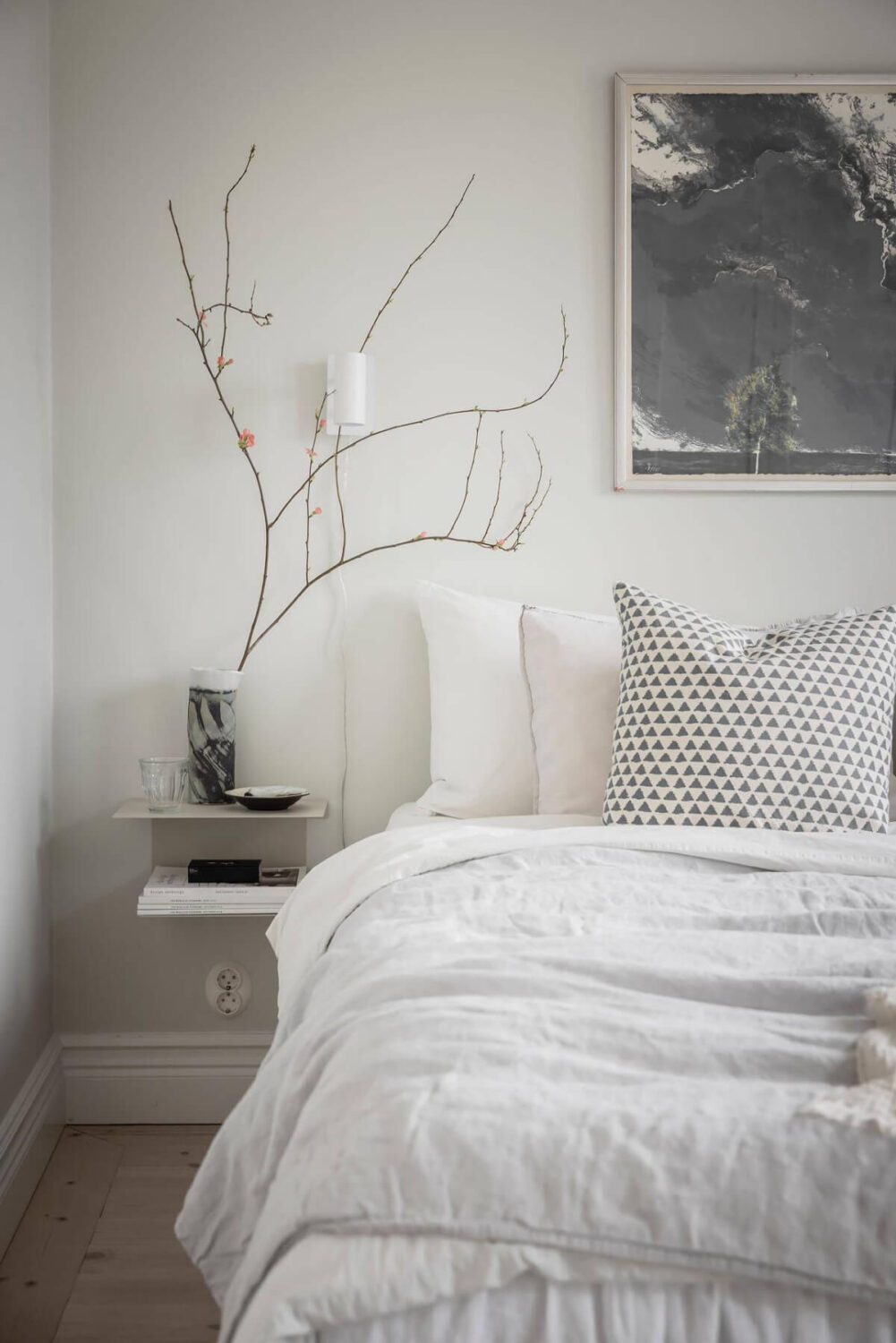 A Light Color Palette in a Stylish Renovated Late 19th Century Apartment 15 bedroom nightstand