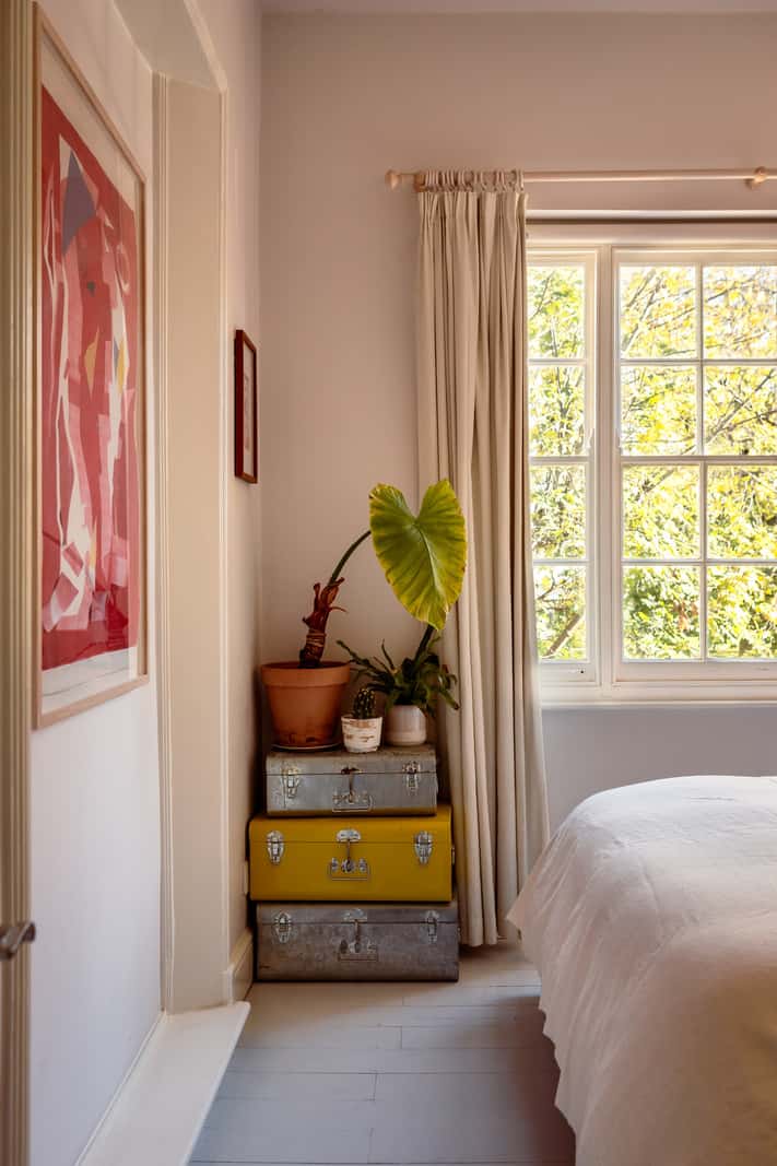 bedroom suitcases A Corner Apartment with Large Windows in a Former London Pub